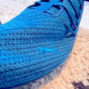 Bright blue PUMA tennis shoes